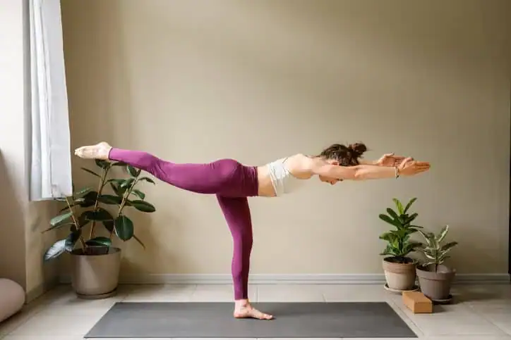 Achieving the Perfect Tone: How Often Should You Exercise for Results? 1 Woman doing Yoga exercise West Bromwich to help with toning the body.