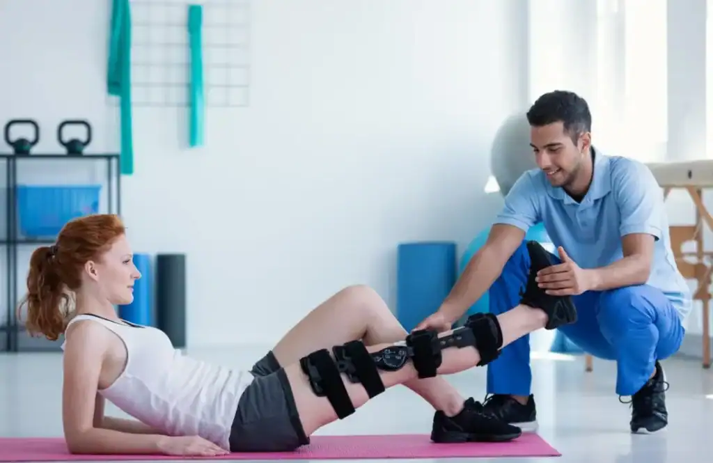 Debunking Meal Timing Myths: The Truth About Muscle Recovery 1 Woman having treatment to help muscle recovery West Bromwich after an injury
